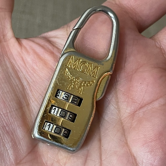 MCM Accessories - Authentic MCM vintage dial lock